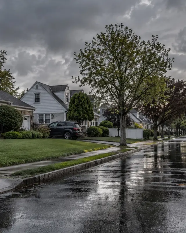 Hicksville residential house after heavy rain, closer residential view