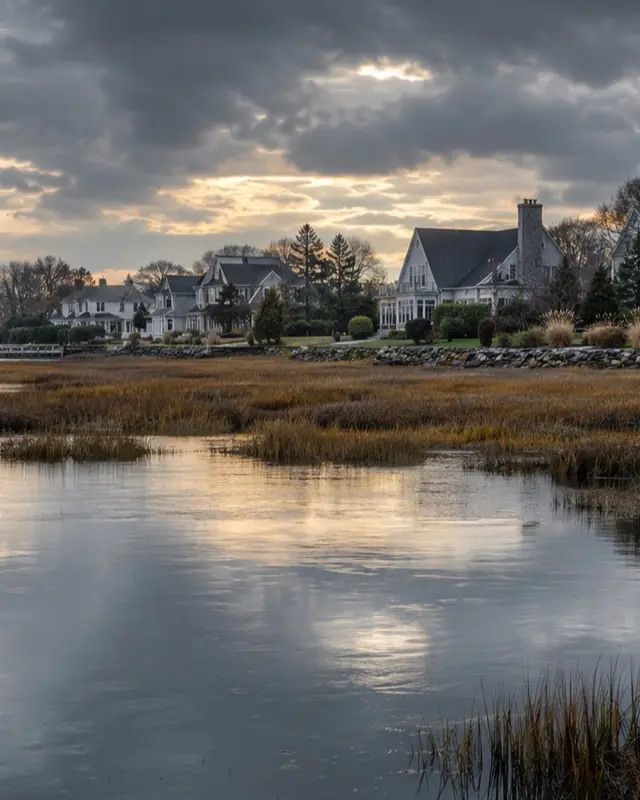 Nassau County homes near south-shore marsh after rain, closer residential view