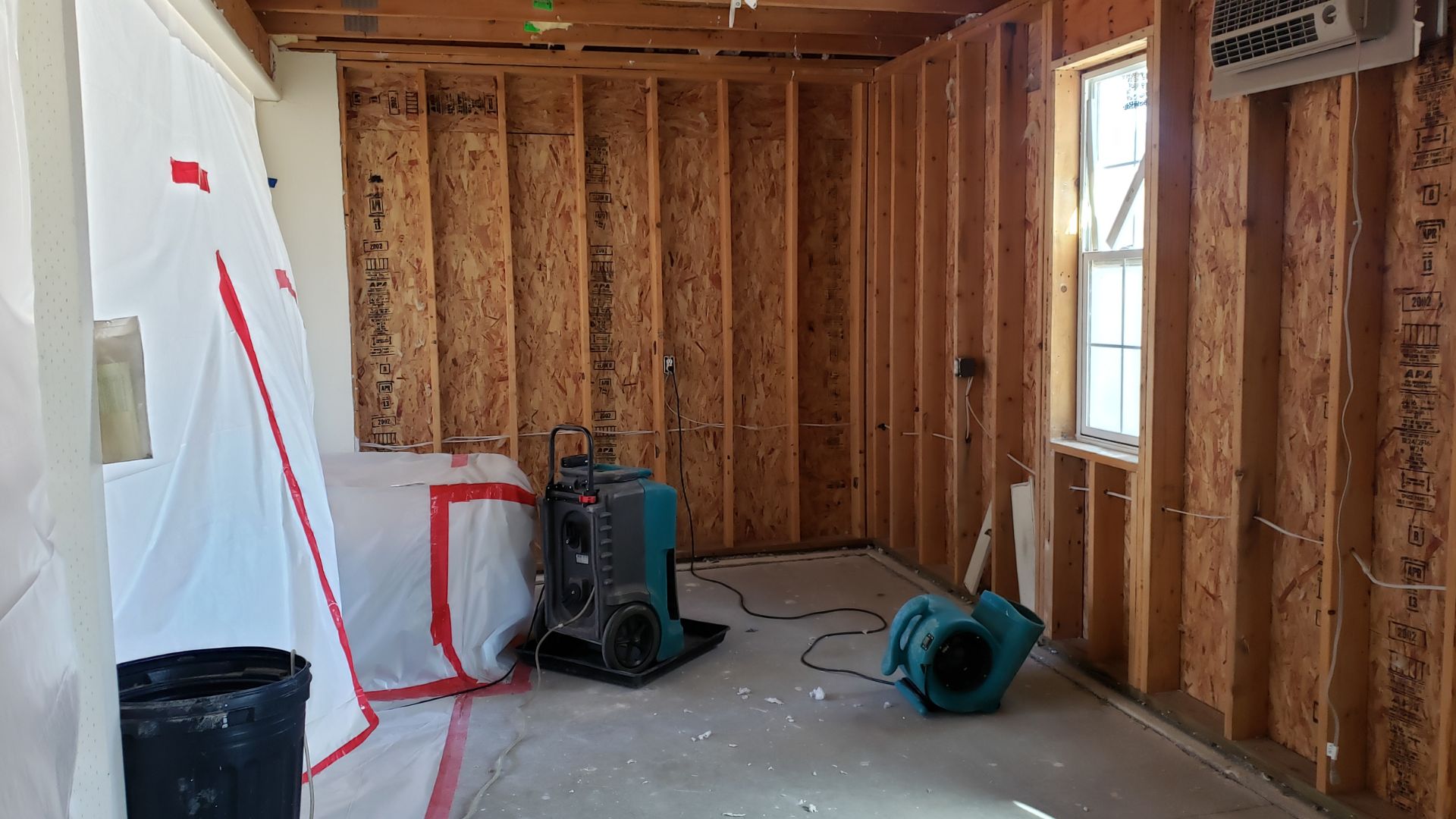 A room that is under construction with a lot of wood